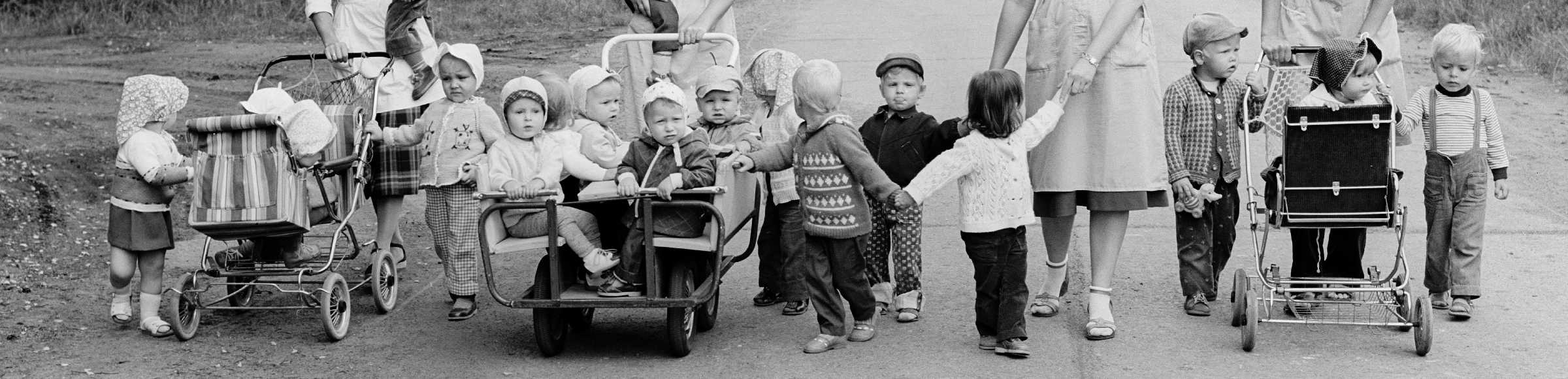 Educators take the nursery school children for a walk in Prora in the federal state Mecklenburg-Vorpommern on the territory of the former GDR, German Democratic Republic