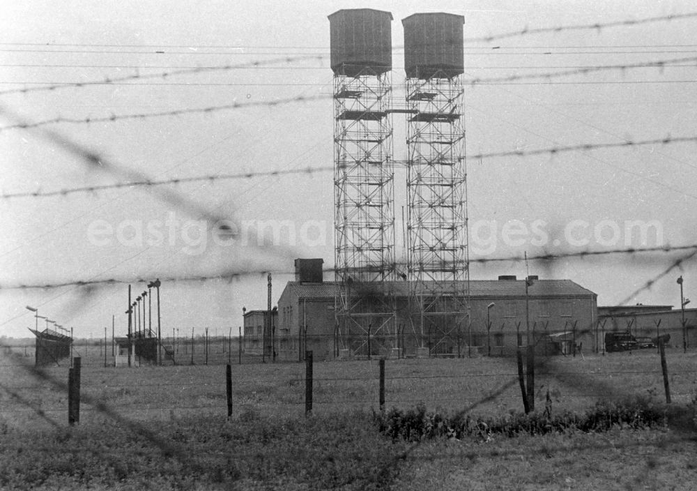 GDR picture archive: Potsdam - Construction site for the expansion of the border fortifications and wall as well as security structures and protective fence systems in the blocking strip of the state border in the district Fahrland in Potsdam, Brandenburg on the territory of the former GDR, German Democratic Republic