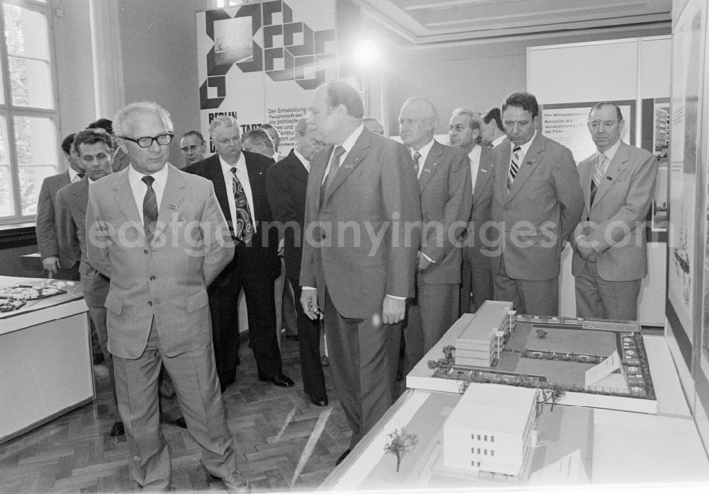 GDR photo archive: Berlin - Members of the party and state leadership with the SED General Secretary Erich Honecker and Guenther Mittag as visitors at the exhibition 7th Building Conference in the Mitte district of East Berlin in the area of the former GDR, German Democratic Republic