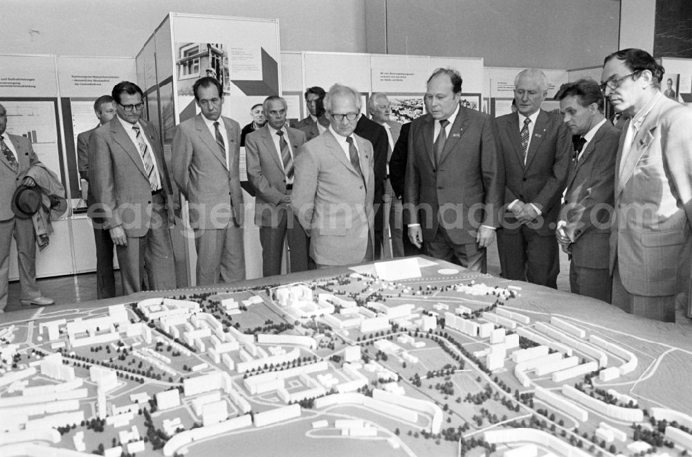 GDR picture archive: Berlin - Members of the party and state leadership with the SED General Secretary Erich Honecker and Guenther Mittag as visitors at the exhibition 7th Building Conference in the Mitte district of East Berlin in the area of the former GDR, German Democratic Republic