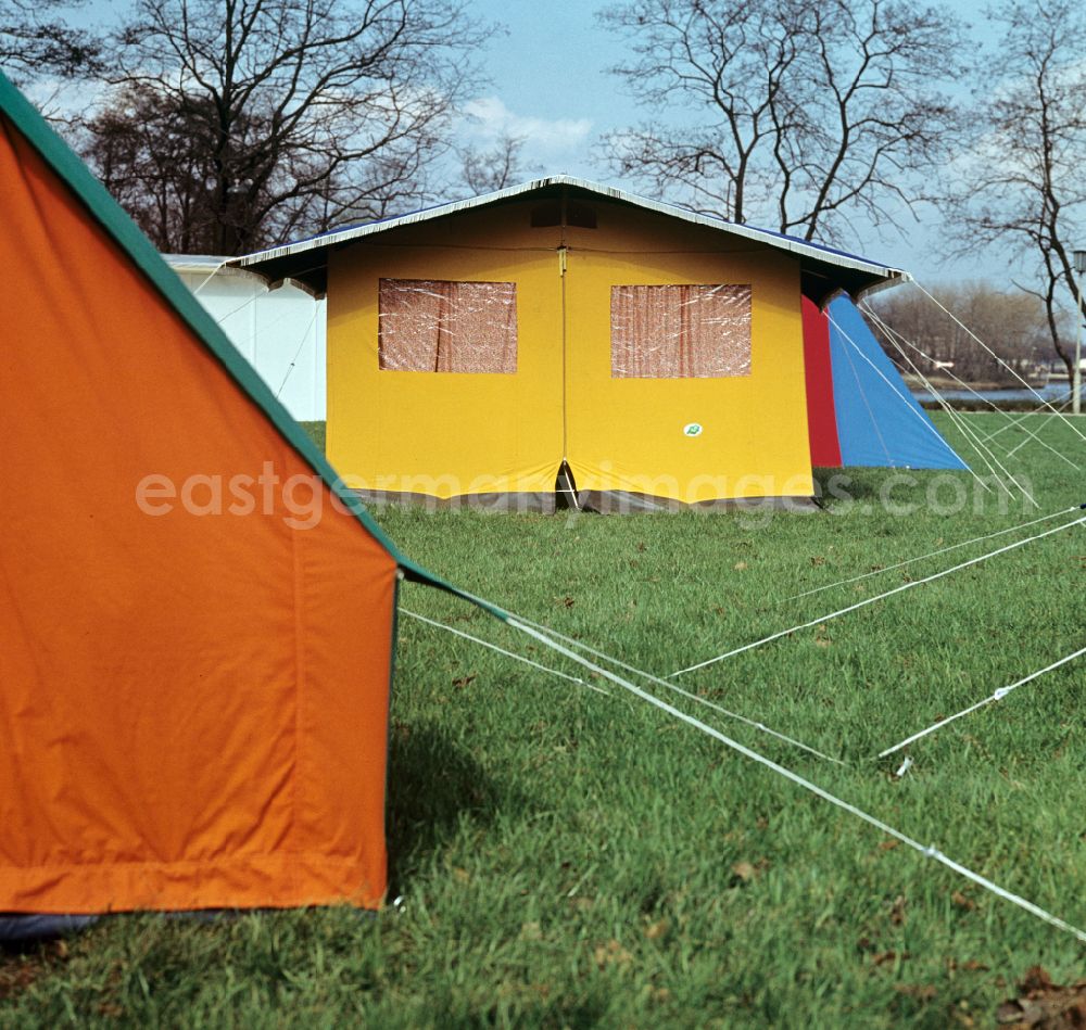 Berlin: At the camping exhibition in Treptower Park, tents in various shapes and colors are presented in Berlin East Berlin on the territory of the former GDR, German Democratic Republic