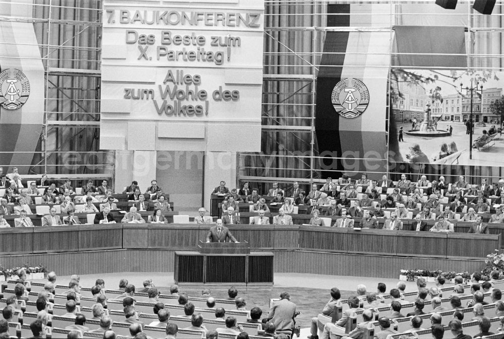 GDR photo archive: Berlin - Delegates during the meeting in the Great Hall of the Palace of the Republic on the occasion of the 7th Building Conference in the Mitte district of East Berlin in the territory of the former GDR, German Democratic Republic