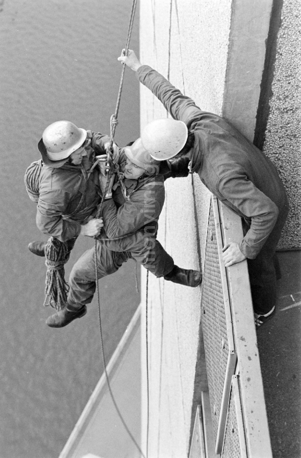 Berlin: Fire brigade rescue exercise on the facade of a residential building in Fischerinsel Street in the Mitte district of East Berlin in the territory of the former GDR, German Democratic Republic