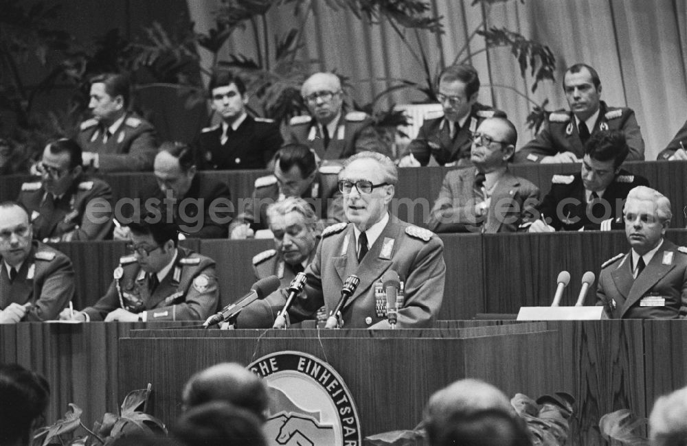 GDR picture archive: Dresden - Colonel General Heinz Kessler (Chief of the Main Staff of the NVA) speaks at the lectern in front of soldiers, non-commissioned officers, officers and generals as members of the NVA National People's Army at the delegates' conference in the Kulturpalast in the Altstadt district of Dresden, Saxony in the territory of the former GDR, German Democratic Republic