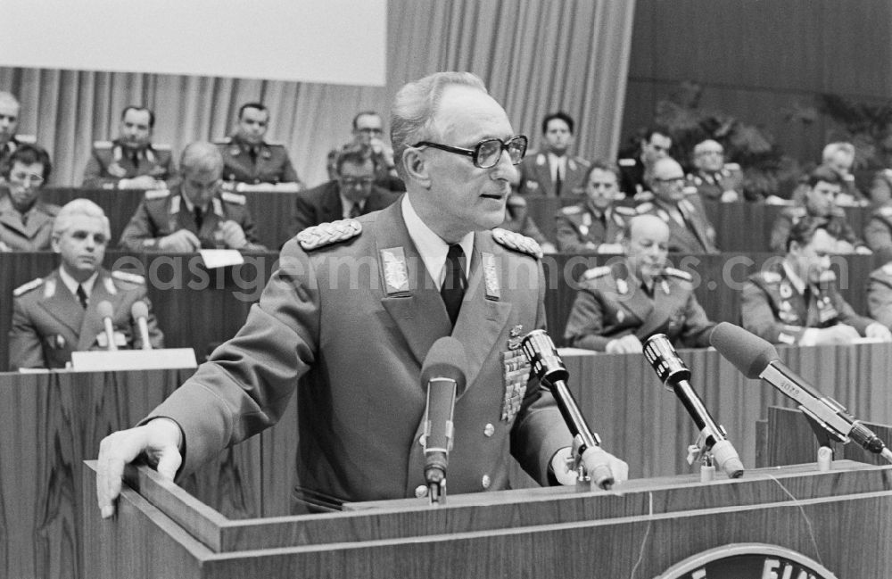 GDR picture archive: Dresden - Colonel General Heinz Kessler (Chief of the Main Staff of the NVA) speaks at the lectern in front of soldiers, non-commissioned officers, officers and generals as members of the NVA National People's Army at the delegates' conference in the Kulturpalast in the Altstadt district of Dresden, Saxony in the territory of the former GDR, German Democratic Republic