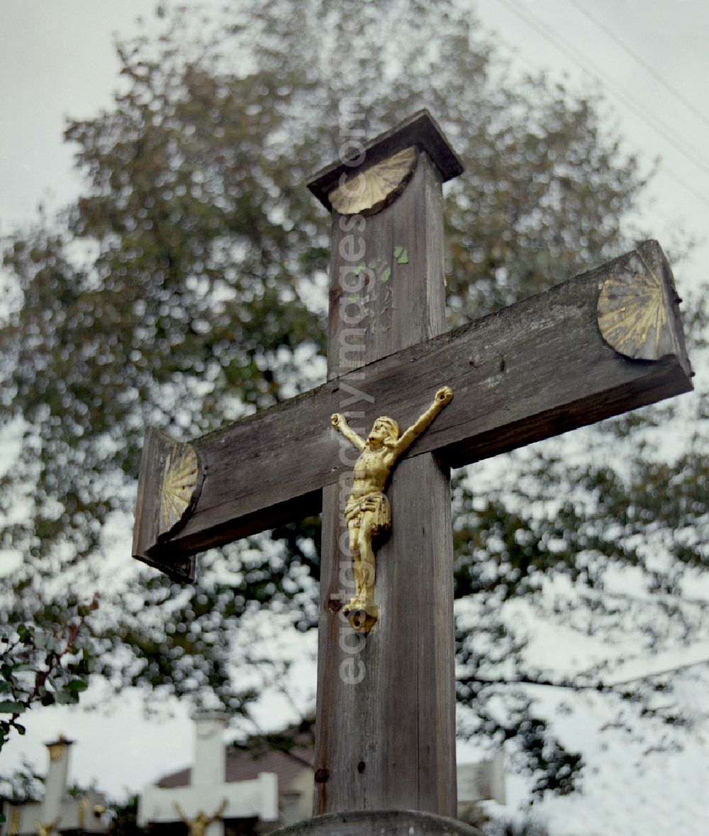 Ralbitz-Rosenthal: Cultural-historical grave cross and gravestone ensemble in the Sorbian cemetery on the main street in Ralbitz-Rosenthal, Saxony in the territory of the former GDR, German Democratic Republic