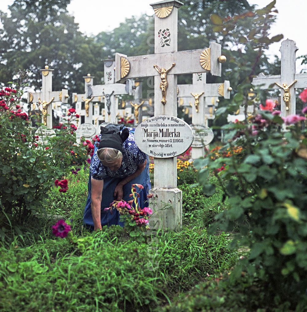 Ralbitz-Rosenthal: Cultural-historical grave cross and gravestone ensemble in the Sorbian cemetery on the main street in Ralbitz-Rosenthal, Saxony in the territory of the former GDR, German Democratic Republic