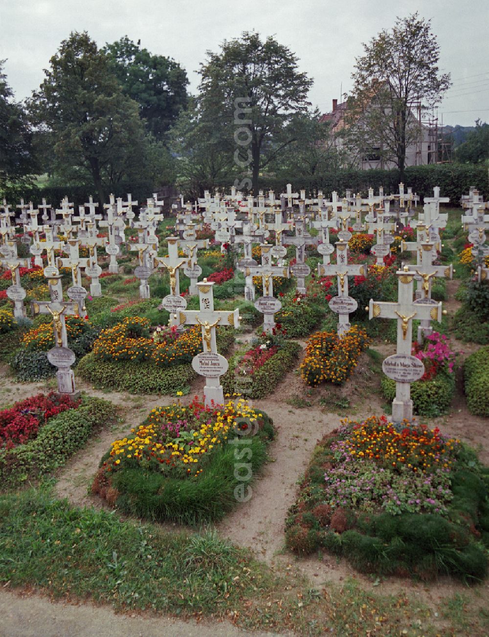 Ralbitz-Rosenthal: Cultural-historical grave cross and gravestone ensemble in the Sorbian cemetery on the main street in Ralbitz-Rosenthal, Saxony in the territory of the former GDR, German Democratic Republic