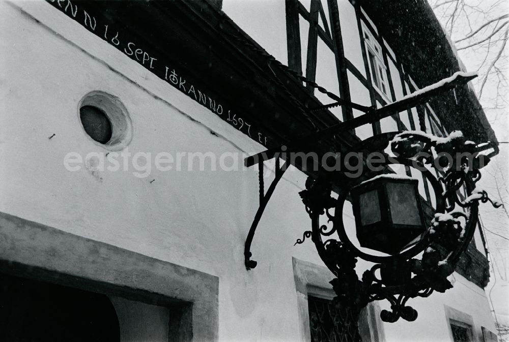 GDR image archive: Freiberg - Craft guild signs and symbols on historic building facades in the city center in the Altstadt district of Freiberg, Saxony in the territory of the former GDR, German Democratic Republic