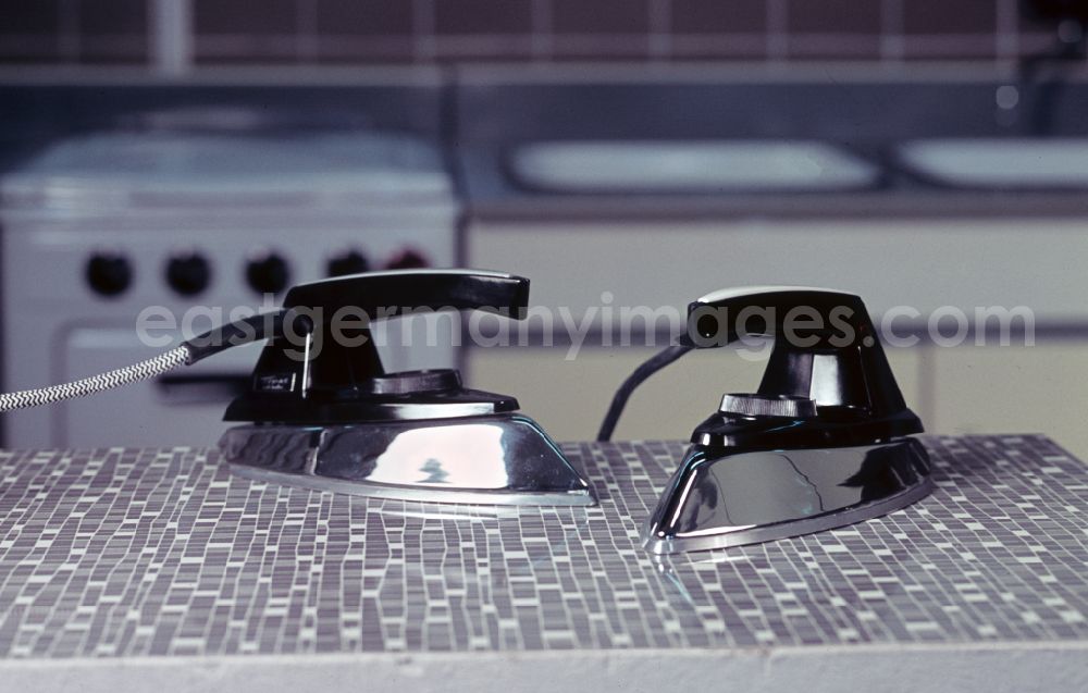 GDR picture archive: Berlin - Household appliance iron Electric BR27 of the manufacturer AKA in a kitchen household in Berlin East Berlin in the territory of the former GDR, German Democratic Republic