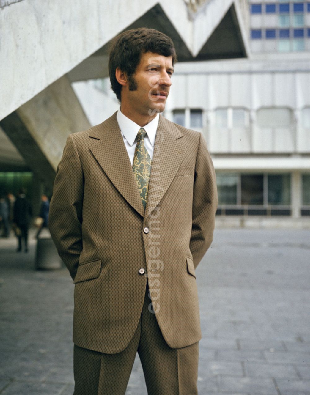 Berlin: A model presents current men's fashion - men's fashion collection in the Mitte district of Berlin East Berlin in the area of the former GDR, German Democratic Republic