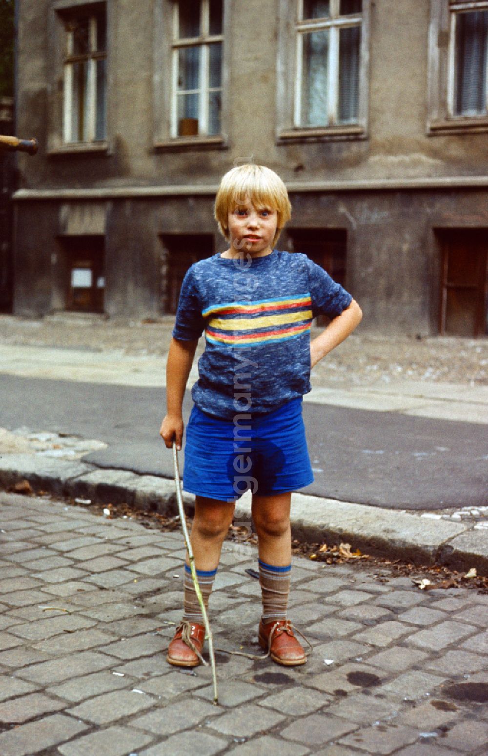 GDR photo archive: Berlin - Boy with wet pants in East Berlin on the territory of the former GDR, German Democratic Republic