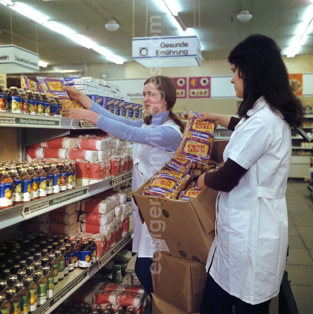 GDR photo archive: Berlin - Mall shopping center with shelves filled with healthy food on street Spandauer Strasse in Berlin Eastberlin on the territory of the former GDR, German Democratic Republic