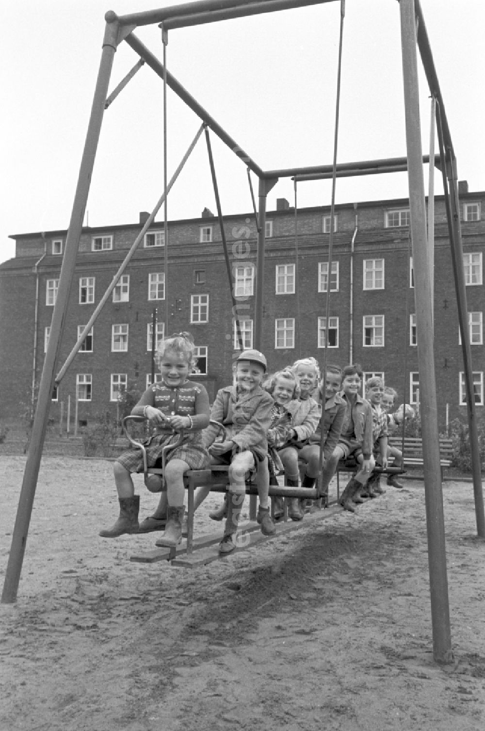 GDR picture archive: Berlin - Children on the climbing frame at a playground in Berlin East Berlin in the territory of the former GDR, German Democratic Republic