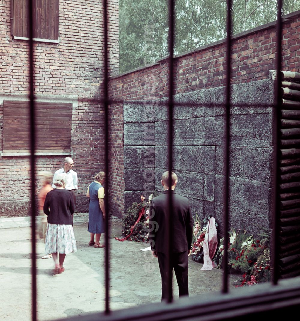 GDR photo archive: Oswiecim - Auschwitz - Facades of the remaining buildings of the concentration camp visitors and tourists warn against forgetting in Oswiecim - Auschwitz in Poland