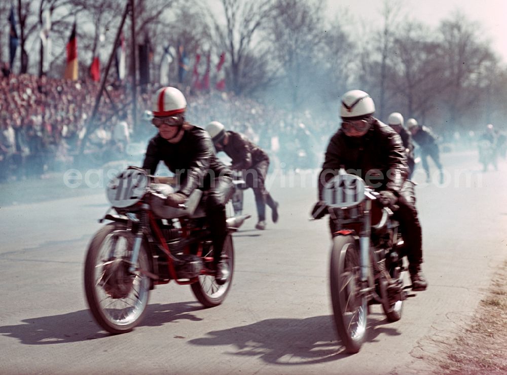 GDR picture archive: Hohenstein-Ernstthal - The starting numbers 111 and 112 on the race track at the motorcycle race on the Sachsenring in Hohenstein-Ernstthal, Saxony in the territory of the former GDR, German Democratic Republic