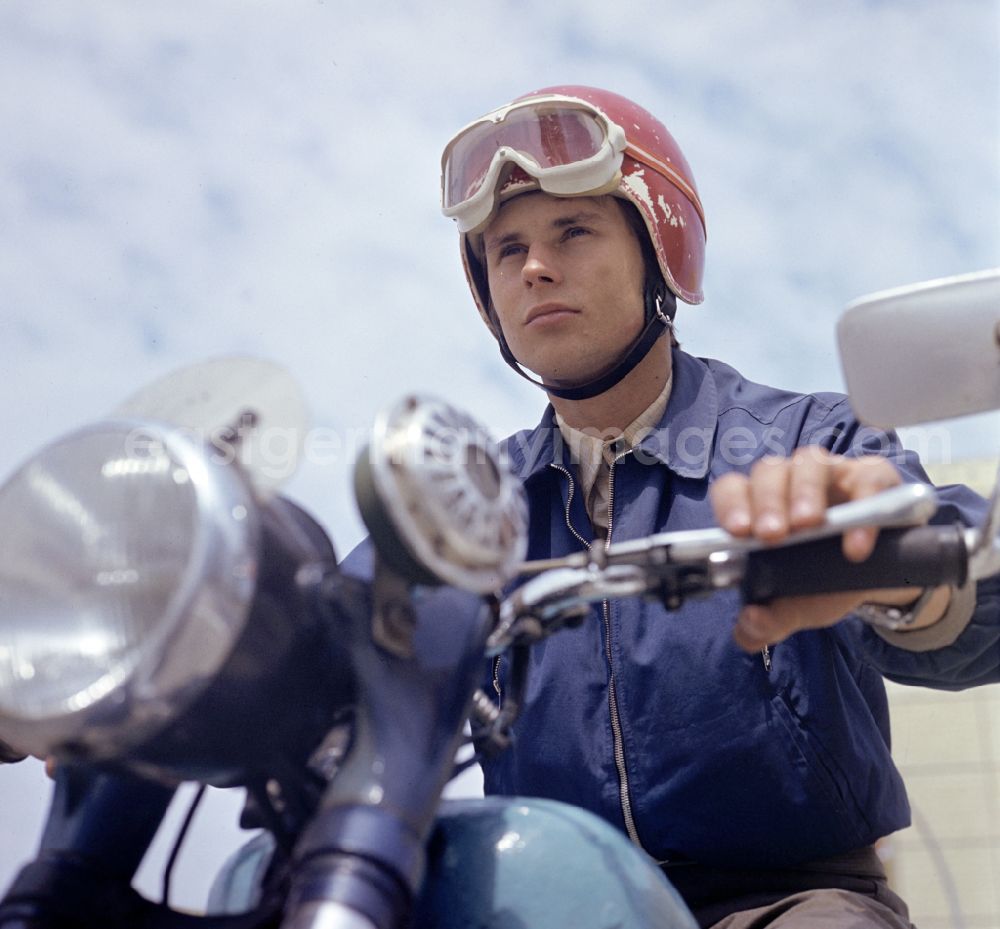 GDR photo archive: Berlin - Motorcycle - motor vehicle in road traffic on street B1 in Berlin Eastberlin on the territory of the former GDR, German Democratic Republic