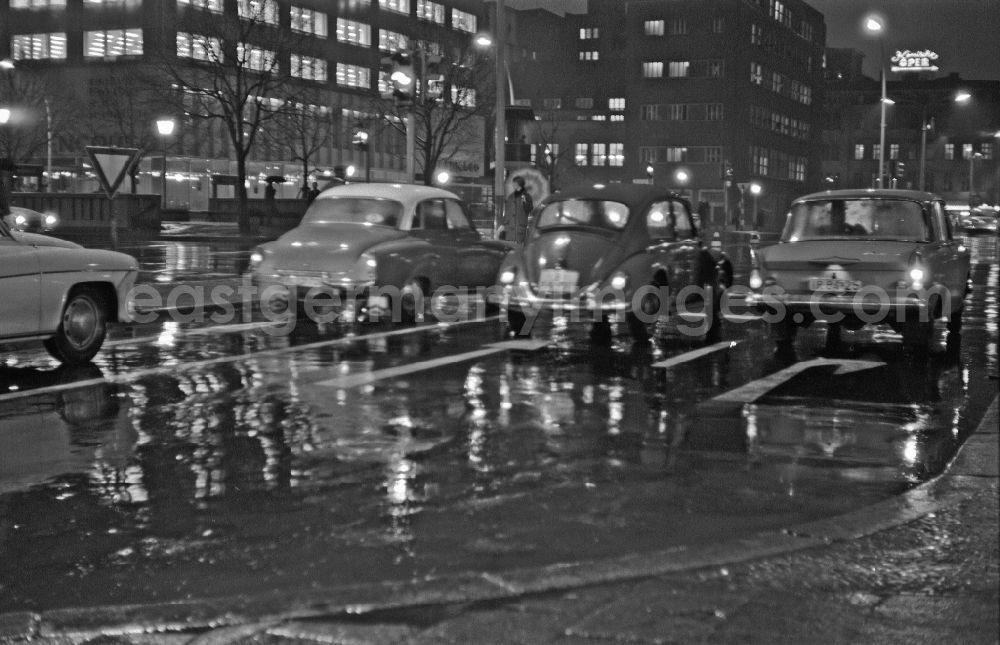 GDR picture archive: Berlin - Car - motor vehicle in road traffic of the types Wartburg, Volkswagen VW Beetle and Moskvitch and at the intersection of Friedrichstrasse and Unter den Linden in the Mitte district of Berlin East Berlin in the area of the former GDR, German Democratic Republic