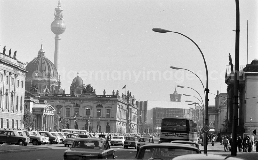 Berlin: Car - Motor vehicle in road traffic at the German Historical Museum on Unter den Linden in the Mitte district of Berlin East Berlin in the area of the former GDR, German Democratic Republic