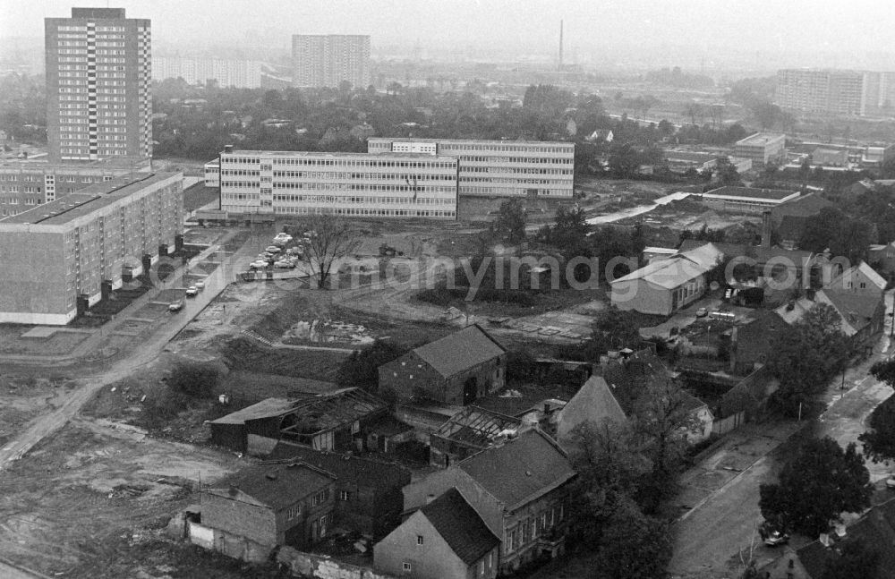 GDR image archive: Berlin - Village center of Alt-Marzahn in front of the facades of an industrially manufactured prefabricated housing estate in the district of Marzahn in Berlin East Berlin in the area of the former GDR, German Democratic Republic