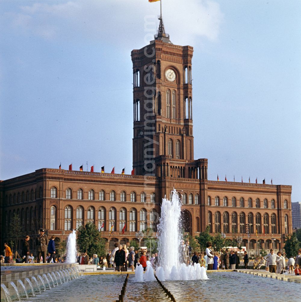 Berlin: Building of the town hall of the city administration Red Town Hall in the foreground water features on Rathausstrasse in the Mitte district of Berlin, East Berlin on the territory of the former GDR, German Democratic Republic