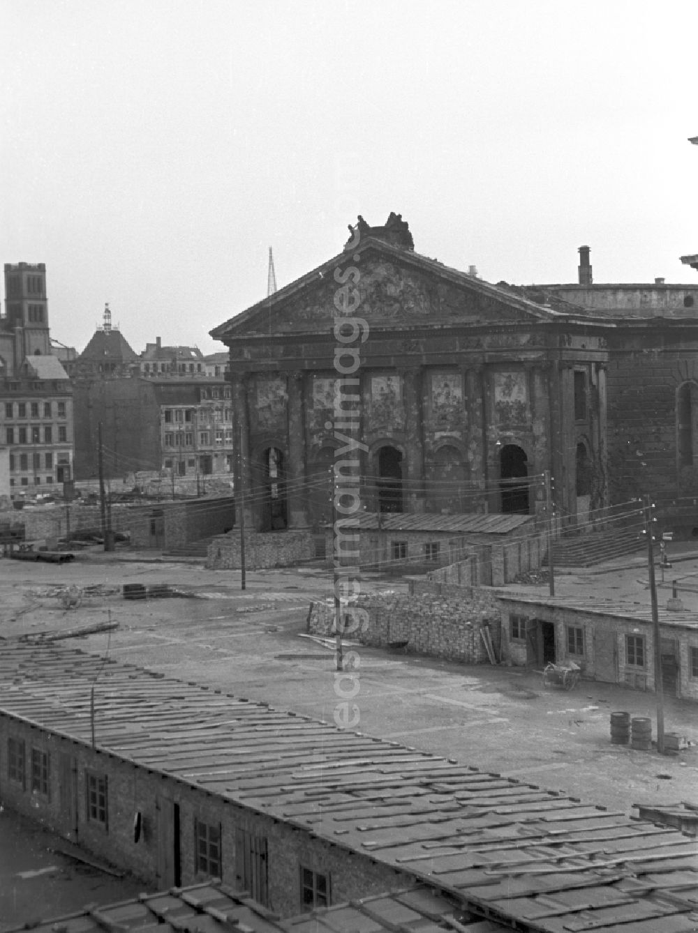 GDR picture archive: Berlin - Ruins of the rest of the facade and roof structure Sankt Hedwigs-Kathedrale on place Bebelplatz in Berlin Eastberlin on the territory of the former GDR, German Democratic Republic