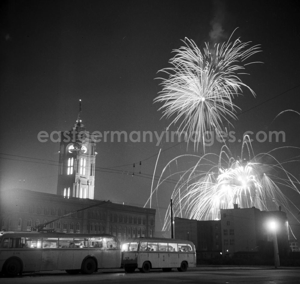 Berlin: New Years Eve fireworks at the Red Town Hall in Berlin East Berlin in the area of the former GDR, German Democratic Republic