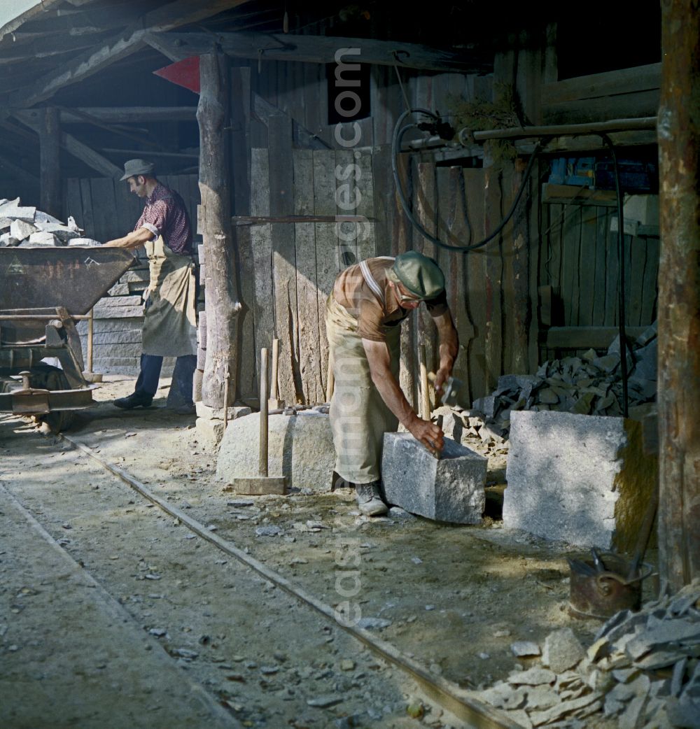 Horka: Quarry workers as a scene from the film and television production Portrait of a Center on the main street in Horka, Saxony in the area of the former GDR, German Democratic Republic