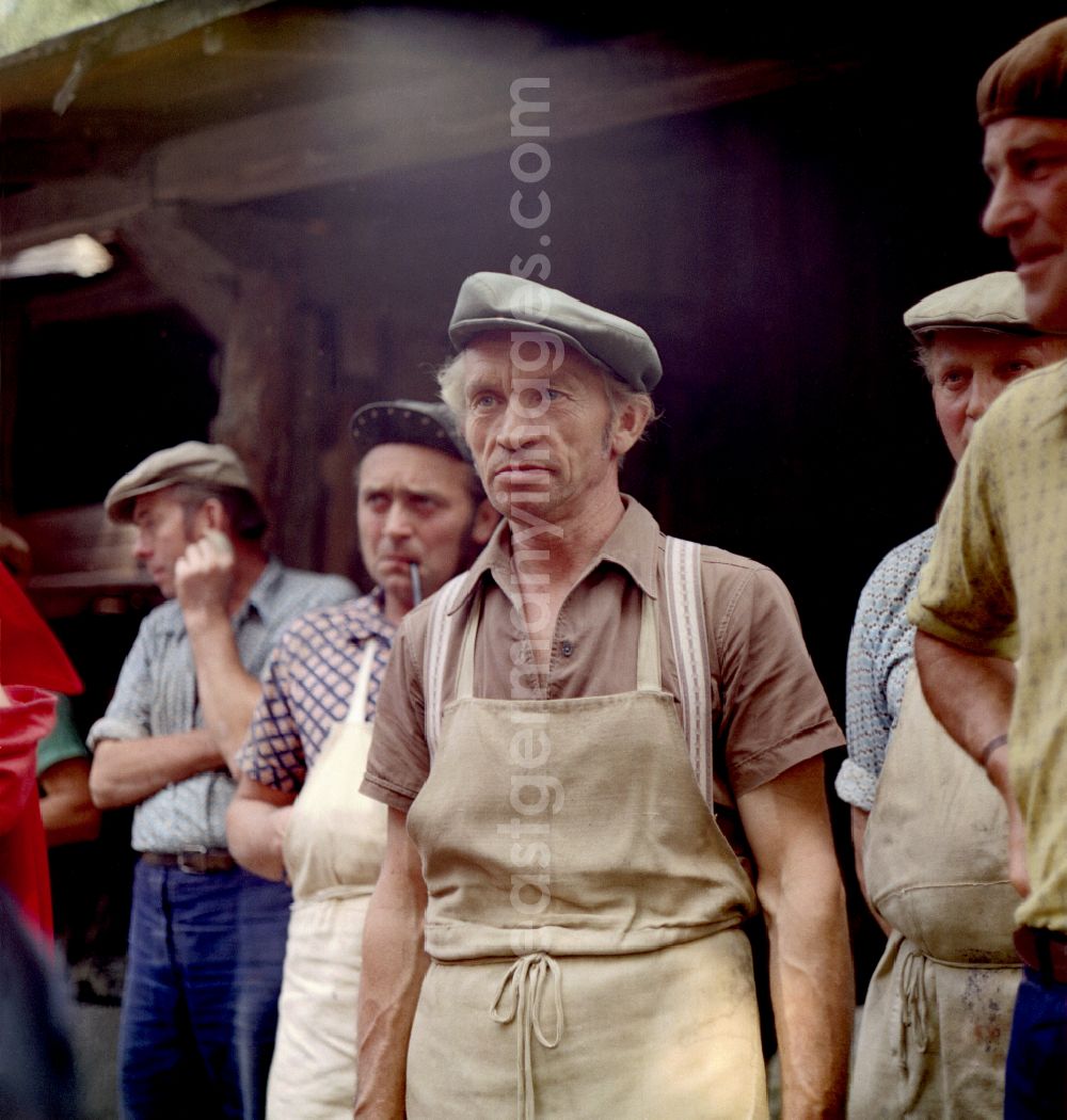 GDR picture archive: Horka - Quarry workers as a scene from the film and television production Portrait of a Center on the main street in Horka, Saxony in the area of the former GDR, German Democratic Republic