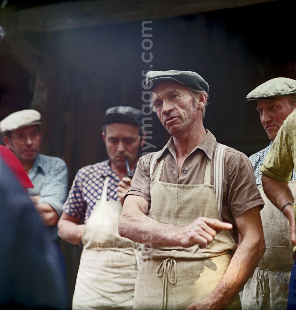 GDR image archive: Horka - Quarry workers as a scene from the film and television production Portrait of a Center on the main street in Horka, Saxony in the area of the former GDR, German Democratic Republic