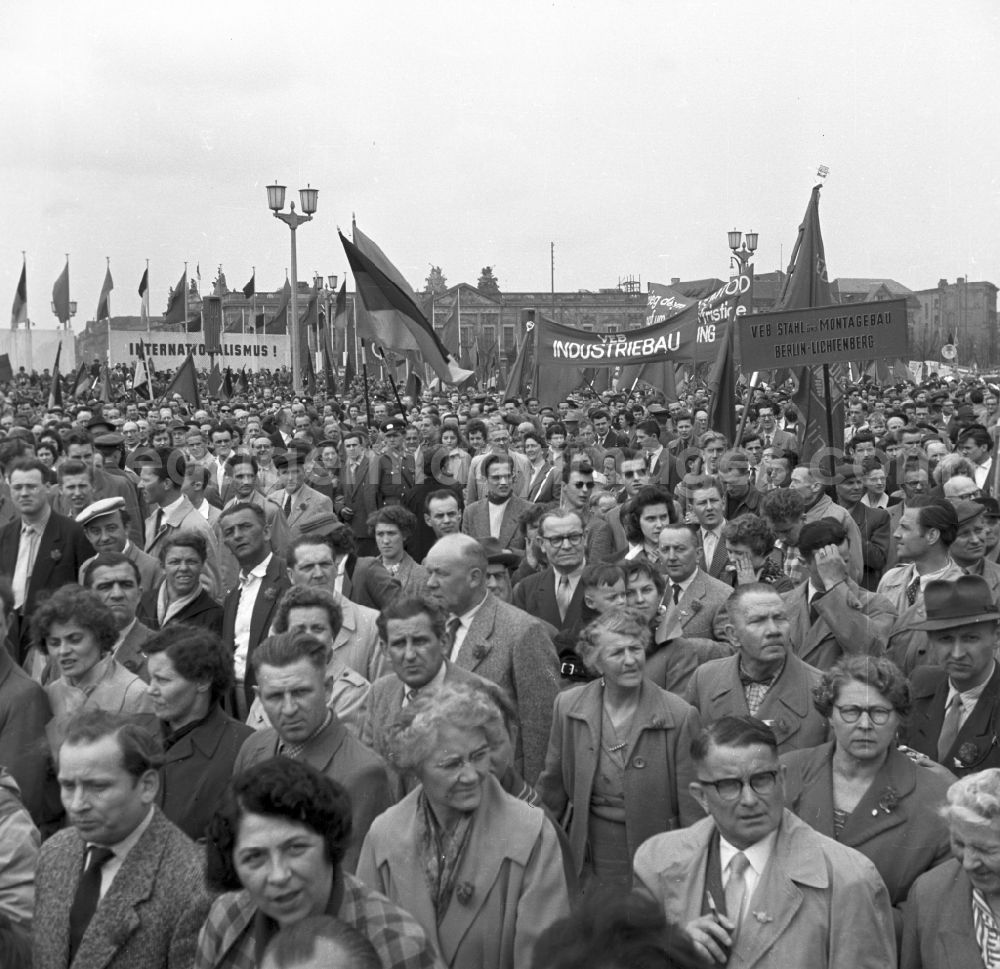 GDR image archive: Berlin - Participants der Demonstrationen zum 1.Mai on the streets of the city center on place Schlossplatz - Marx-Engels-Platz - Lustgarten in the district Mitte in Berlin Eastberlin on the territory of the former GDR, German Democratic Republic