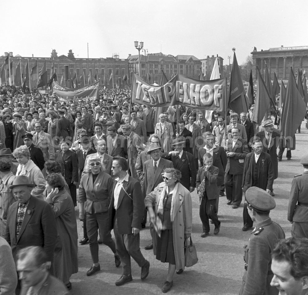 GDR photo archive: Berlin - Participants der Demonstrationen zum 1.Mai on the streets of the city center on place Schlossplatz - Marx-Engels-Platz - Lustgarten in the district Mitte in Berlin Eastberlin on the territory of the former GDR, German Democratic Republic