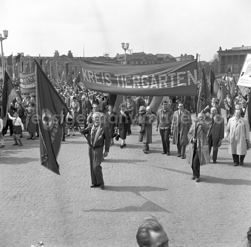 Berlin: Workers from West Berlin taking part in the May 1st demonstrations with the banner Kreis Tiergarten on the streets of the city center at Schlossplatz - Marx-Engels-Platz - Lustgarten in the Mitte district of Berlin, East Berlin on the territory of the former GDR, German Democratic Republic