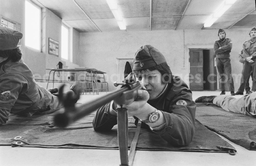 GDR picture archive: Hoppegarten - Practical training with a pre-military character in preparation for military service in der Uniform der GST Gesellschaft fuer Sport und Technik in Hoppegarten, Brandenburg on the territory of the former GDR, German Democratic Republic