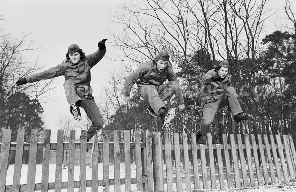 GDR picture archive: Hoppegarten - Practical training with a pre-military character in preparation for military service in der Uniform der GST Gesellschaft fuer Sport und Technik in Hoppegarten, Brandenburg on the territory of the former GDR, German Democratic Republic