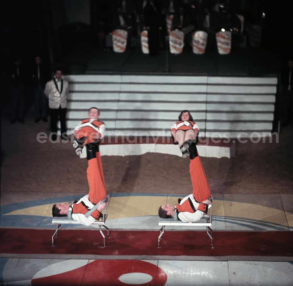 GDR photo archive: Berlin - Acrobatic performance in the ring of the Circus Busch in Berlin East Berlin in the territory of the former GDR, German Democratic Republic