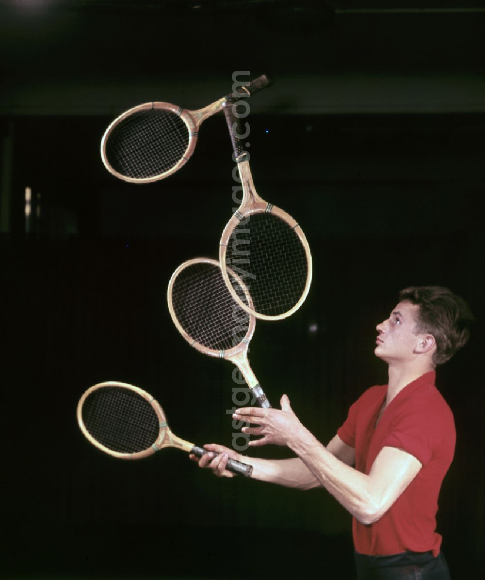 GDR image archive: Berlin - Juggler with tennis rackets in the ring of the Circus Busch in Berlin East Berlin in the territory of the former GDR, German Democratic Republic