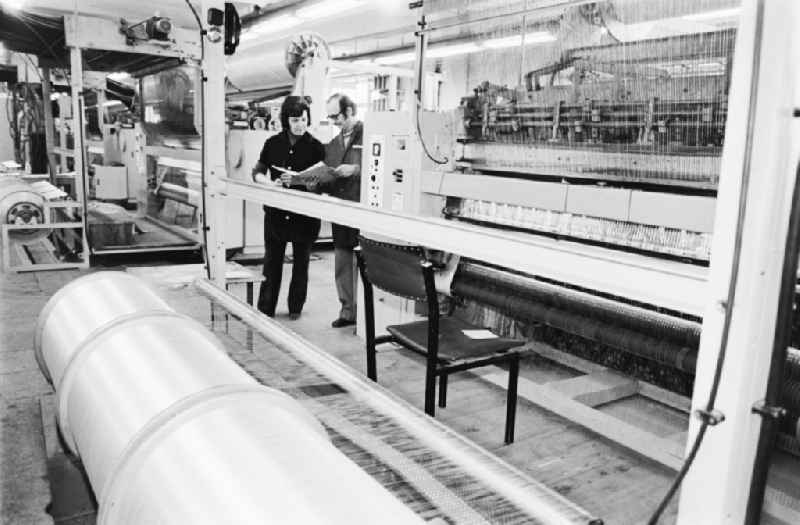 Workplace, factory equipment and production process in the OPEW (Obererzgebirgische Posamenten- und Effekten-Werk) in Annaberg-Buchholz, Saxony in the territory of the former GDR, German Democratic Republic