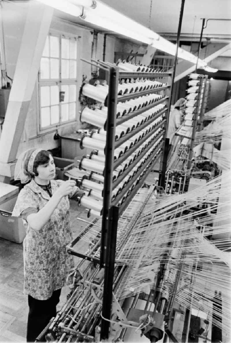 Workplace, factory equipment and production process in the OPEW (Obererzgebirgische Posamenten- und Effekten-Werk) in Annaberg-Buchholz, Saxony in the territory of the former GDR, German Democratic Republic