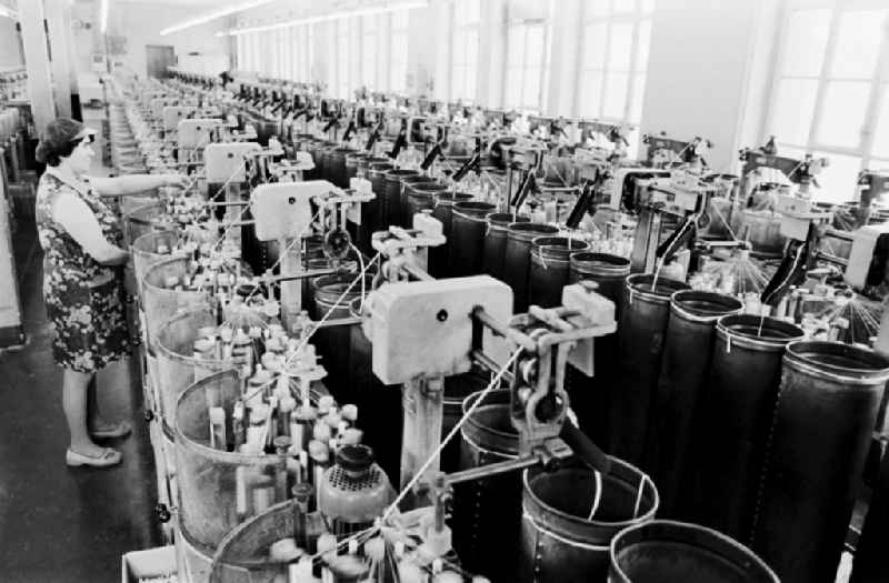 Workplace, factory equipment and production process in the OPEW (Obererzgebirgische Posamenten- und Effekten-Werk) in Annaberg-Buchholz, Saxony in the territory of the former GDR, German Democratic Republic