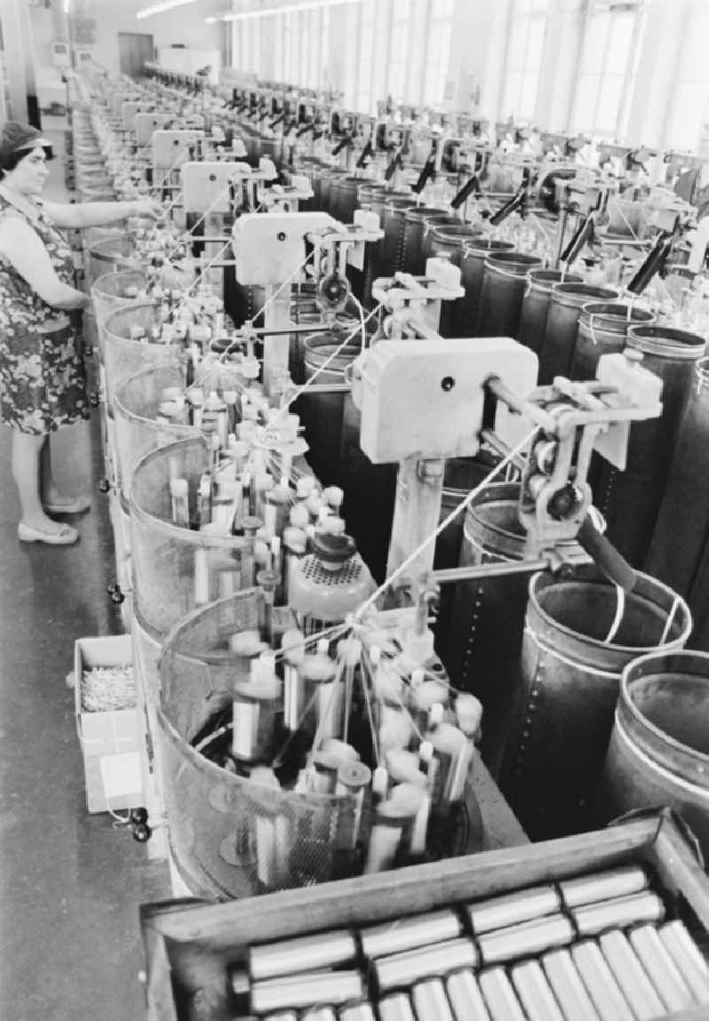 Workplace, factory equipment and production process in the OPEW (Obererzgebirgische Posamenten- und Effekten-Werk) in Annaberg-Buchholz, Saxony in the territory of the former GDR, German Democratic Republic