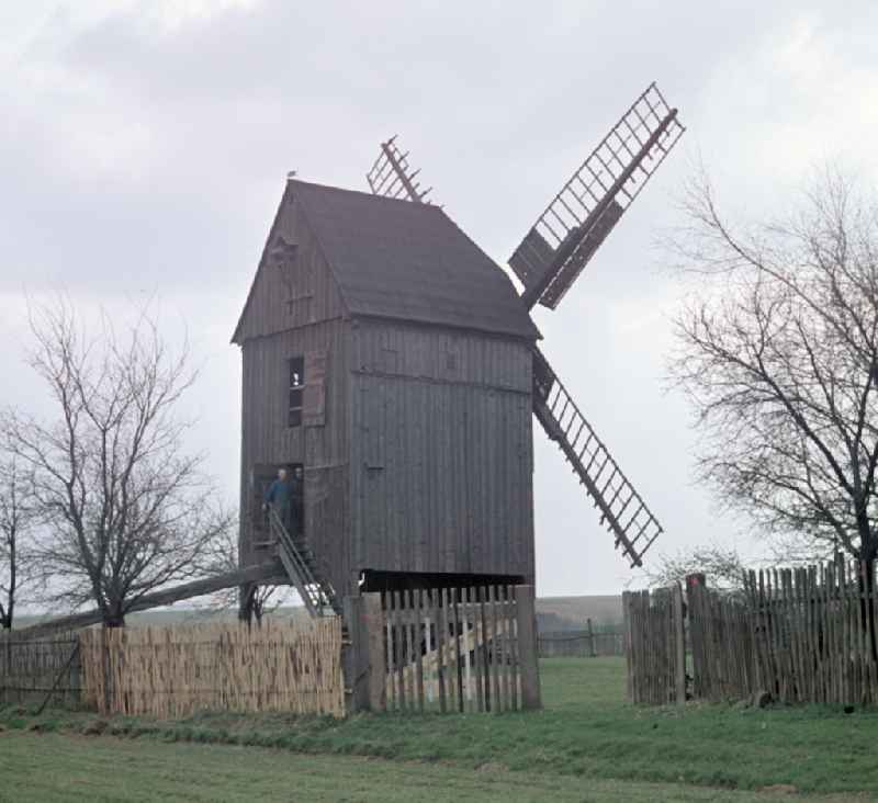 Historic wooden post mill on Trebbiner Strasse in Beelitz, Brandenburg in the area of the former GDR, German Democratic Republic