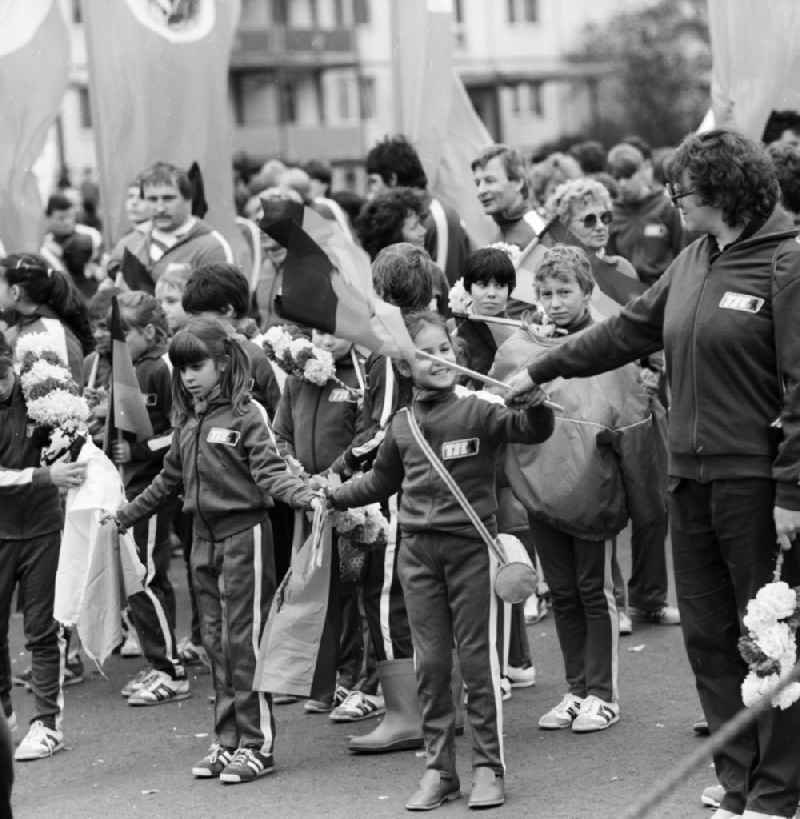 Athletes of the sports club TSC (Berliner Turn- und Sportclub)Berlin will meet with flags and other winged elements for the 1st May Demonstration in Berlin, the former capital of the GDR, German Democratic Republic