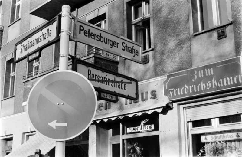 A new street sign shows the renaming of Bersarinstrasse in Petersburger Strasse on the corner Strassmannstrasse in Berlin - Friedrichshain, the former capital of the GDR, German Democratic Republic