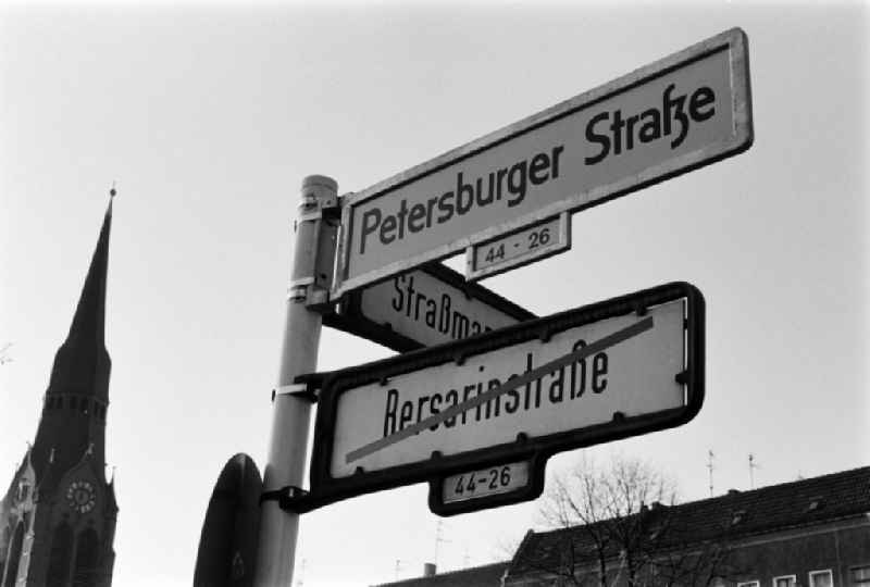 A new street sign shows the renaming of Bersarinstrasse in Petersburger Strasse on the corner Strassmannstrasse in Berlin - Friedrichshain, the former capital of the GDR, German Democratic Republic
