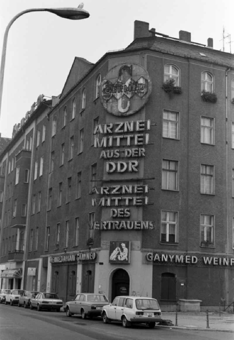 Advertisement for 'GERMED - drugs from the GDR' is located above the closed wine restaurant Ganymed at Schiffbauerdamm in Berlin - Mitte, the former capital of the GDR, German Democratic Republic