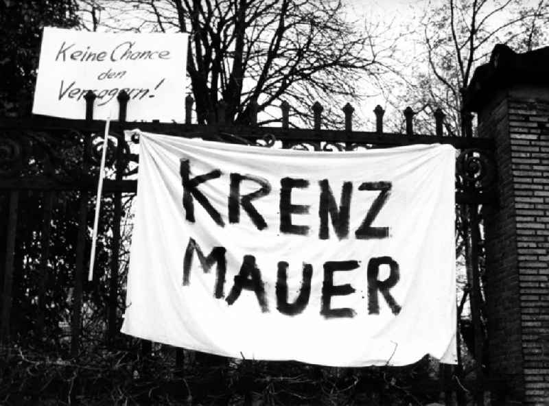 Protest poster and banner solution ' Krenz = Mauer ' at the fence of the church Gethsemanekirche on Stargarder Strasse in the district Prenzlauer Berg in Berlin, the former capital of the GDR, German Democratic Republic