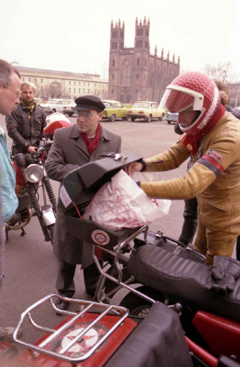 PDS - left - politician Gregor Gysi drives with the sidecar of an MZ - motorcycle in front of the entrance of the former Central Committee of the SED and headquarters of the PDS (today's Foreign Office - Ministry of Foreign Affairs) in the district Mitte in Berlin East Berlin in the area of the former GDR, German Democratic Republic