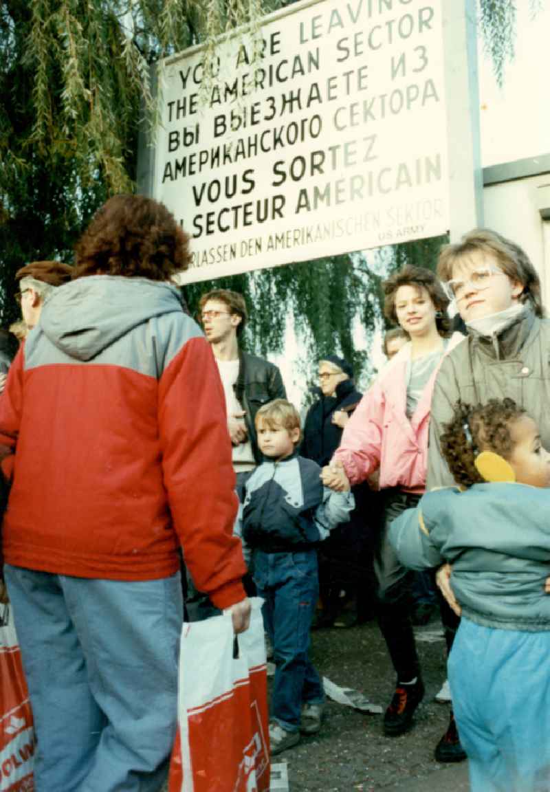 Structures and areas of the GueSt border crossing point - Crowds of people after the opening of the Wall on street Oberbaumbruecke in the district Friedrichshain in Berlin Eastberlin on the territory of the former GDR, German Democratic Republic