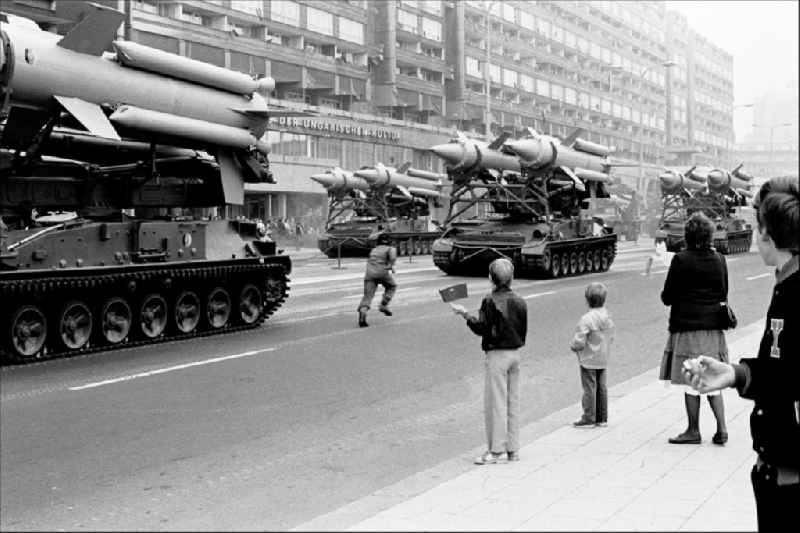 Parade ride of military and combat technology of mobile anti-aircraft systems on a tracked vehicle with two-stage radar-guided 3M8 anti-aircraft missiles of the NVA National Peoples Army on Karl-Liebknecht-Strasse in the Mitte district of Berlin East Berlin on the territory of the former GDR, German Democratic Republic